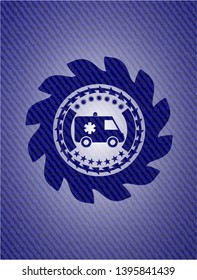 ambulance icon inside jean or denim emblem or badge background