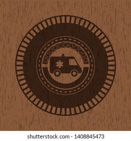 ambulance icon inside retro wooden emblem