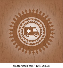ambulance icon inside wood emblem. Vintage.