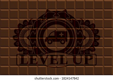Ambulance icon and Level Up text chocolate bar realistic badge. Brown graceful background. Vector illustration. 