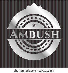 Ambush silvery emblem or badge