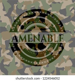 Amenable written on a camouflage texture