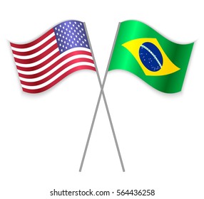 American and Brazilian crossed flags. United States of America combined with Brazil isolated on white. Language learning, international business or travel concept.