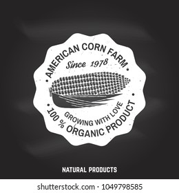 American corn Farm Badge or Label on the chalkboard. Vector illustration. Vintage typography design with corn silhouette. Elements on the theme of the corn farming business. Farm insignia and patches