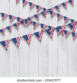 American Flag Bunting On A Wooden Background