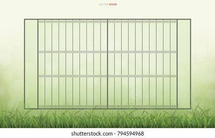 American football field for background. With green grass and light blurred bokeh background. Vector illustration.