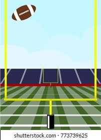 American football flying through goal post in field and stadium