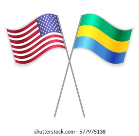 American and Gabonese crossed flags. United States of America combined with Gabon isolated on white. Language learning, international business or travel concept.