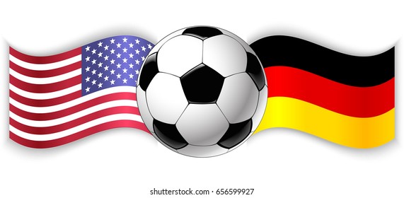 American and German wavy flags with football ball. United States of America combined with Germany isolated on white. Football match or international sport competition concept.