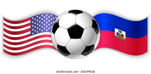 American and Haitian wavy flags with football ball. United States of America combined with Haiti isolated on white. Football match or international sport competition concept.