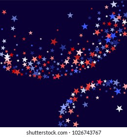 American Independence Day stars background.  Holiday confetti in USA flag colors for Independence Day. Red blue white stars American patriotic banner. July 4 holiday stardust on dark blue.