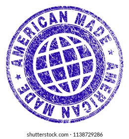 AMERICAN MADE stamp print with distress texture. Blue vector rubber seal print of AMERICAN MADE title with dust texture. Seal has words arranged by circle and planet symbol.