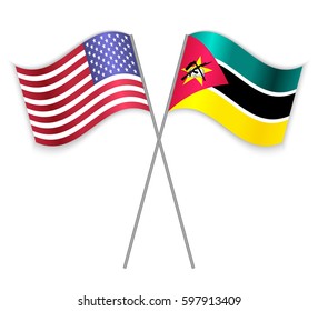 American and Mozambican crossed flags. United States of America combined with Mozambique isolated on white. Language learning, international business or travel concept.