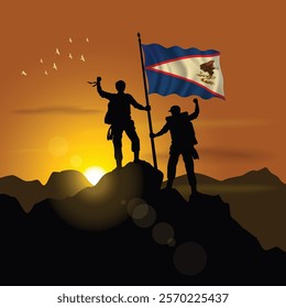 American Samoa flag, silhouette of two climbers holding flags at sunset