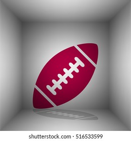 American simple football ball. Bordo icon with shadow in the room.