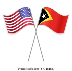 American and Timorese crossed flags. United States of America combined with East Timor isolated on white. Language learning, international business or travel concept.