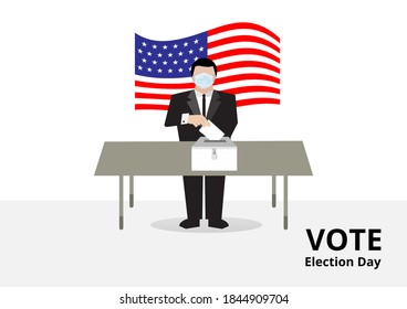 American voter with medical mask to prevent Covid-19 corona virus voting to ballot drop box for election day campaign