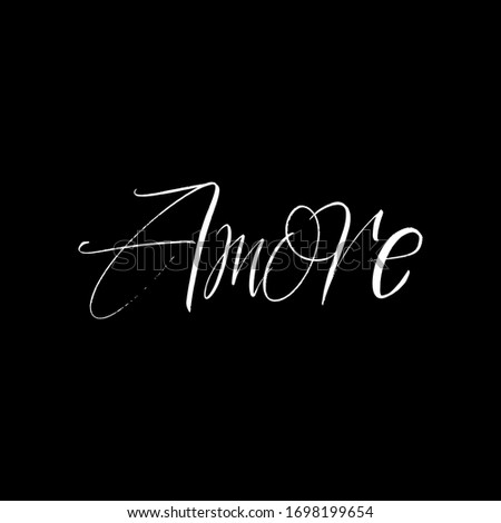 Amore brush paint hand drawn lettering on black background. Love in italian language design templates for greeting cards, overlays, posters