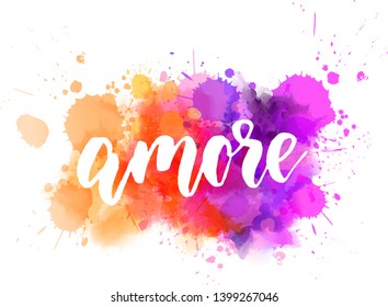 Amore - Love in Italian language. Handwritten modern calligraphy lettering text on multicolored watercolor paint splash.