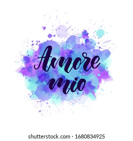 Amore mio - My love in Italian language. Handwritten modern calligraphy lettering text on multicolored watercolor paint splash.