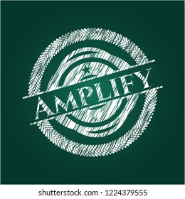 Amplify chalkboard emblem written on a blackboard