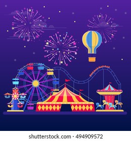 Amusement park at night with fireworks, balloon and  rides