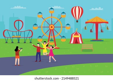 Amusement park vector concept. Young woman using a digital camera to taking photo her friends in the amusement park while enjoying leisure together