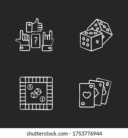 Amusing games chalk white icons set on black background. Traditional gambling and leisure activities. Charades, poker, property trading and dice games. Isolated vector chalkboard illustrations