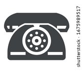 analog telephone black icon on white background