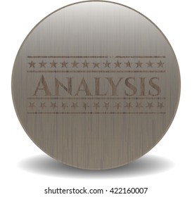 Analysis badge with wood background