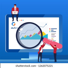 Analyze data with a magnifying glass in front of the computer screen