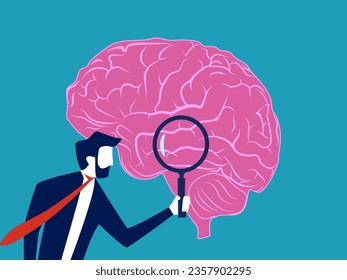 Analyze thoughts. Businessman uses a magnifying glass to examine the brain