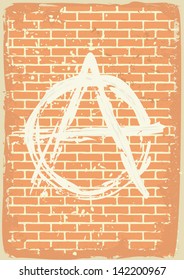 anarchy sign on grunge brick wall