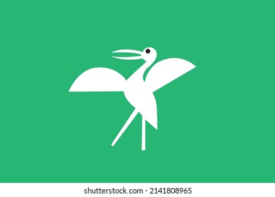 Anastomus oscitans on a green background (vector image)