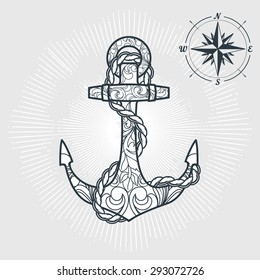 Anchor with floral decorations and rope