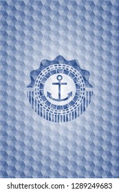 anchor icon inside blue emblem or badge with abstract geometric pattern background.