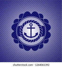 anchor icon inside emblem with denim texture