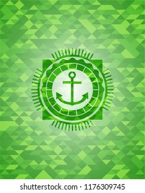 anchor icon inside green mosaic emblem