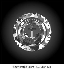 anchor icon inside grey camouflaged emblem