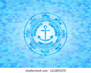 anchor icon inside light blue mosaic emblem