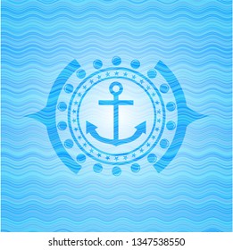 anchor icon inside light blue water emblem.