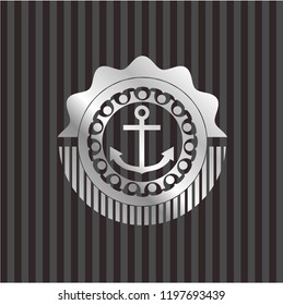 anchor icon inside silver badge or emblem
