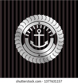 anchor icon inside silver emblem or badge