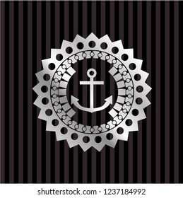 anchor icon inside silvery badge or emblem