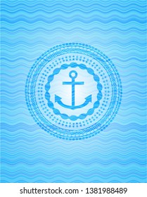 anchor icon inside sky blue water wave style emblem.