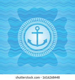 anchor icon inside water wave representation badge.