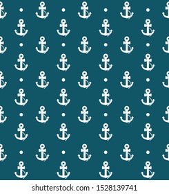 Anchor pattern with polka dots. Blue nautical background seamless design.