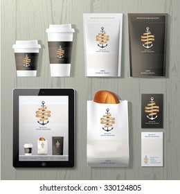 The anchors coffee shop corporate identity template design set on wood background