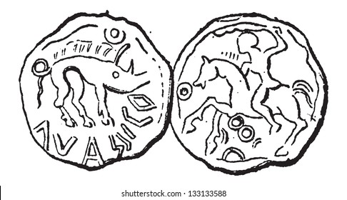 Ancient Celtic Coin, showing Boar (front) and Hunter on Horseback (back), vintage engraved illustration. Dictionary of Words and Things - Larive and Fleury - 1895