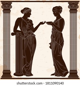 An ancient Greek young woman in a tunic with a jug in her hands serves a cup of wine to the lady. Two girls between the columns.